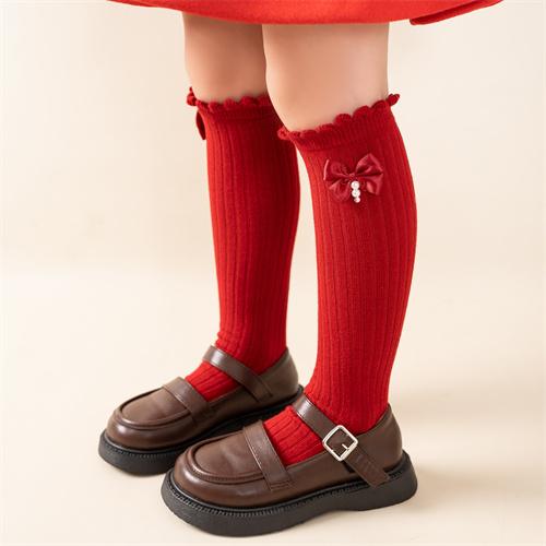 Red New Year socks for children supplied by manufacturers